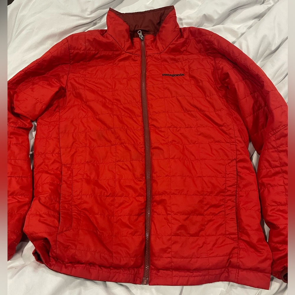 Patagonia jacket. Size medium. Very warm. Reversible.